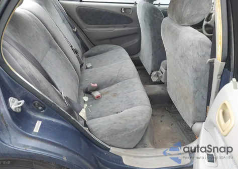 2000 Toyota Corolla Le z USA, uszkodzony, nr VIN 2T1BR12EXYC297082